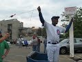 ronnie woo woo outside wrigley field after the cubs just beat the cardinals.