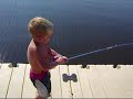 Boy Catches Hybrid Striped Bass with Spider Man Fishing Rod
