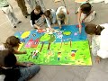Kinderen St. Josephschool schilderen bouwmuur Kinderen St. Josephschool schilderen bouwmuur