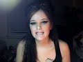 i posted this on xplx but some people liked it so i thought i would post it on here too. i know that therealparis also makes way better amy winehouse videos than this. i just happened to crimp my hair and then ended up coming out looking like this. uh... its not a real tattoo, people!!