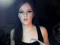 i posted this on xplx but some people liked it so i thought i would post it on here too. i know that therealparis also makes way better amy winehouse videos than this. i just happened to crimp my hair and then ended up coming out looking like this. uh... its not a real tattoo, people!!