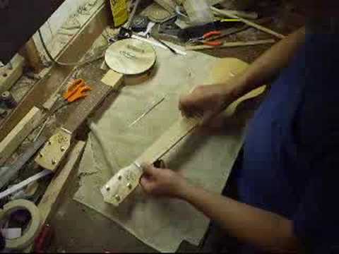 how to adjust ukulele action