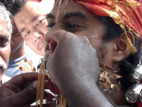 Tongue Piercing at Thaipusam in Penang