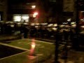 Riot police charge on protesters at McGill University, Montreal, Canada