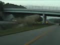Insane airborne car crash into overpass
