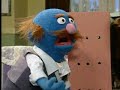 [Sesame Street] Grover sells wigs to that blue guy