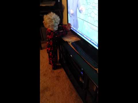 Kid Tries To Stop Words From Leaving The TV LOL!