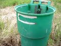 how not to shoot your trash can with a glock 17-c in auto mode. look, the trash can even bleeds!