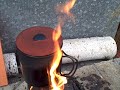 This was a test of the material being used as knob on the pot lid. It is heat resistant up to 500 degrees. Watch how the flames come up over the top of the pot and go towards the knob. The material used was very sucessful. No signs of melting or deterioation in strength. The pot lid is made of silicone rubber. I'll be creating a thread at www.bplite.com to show the results of the test and to include the variety of lids made for GI military cups made of stainless steel. Wood fires produce a great amount of heat up and over the top of the pot. Lots of ash and soot can get into the pot. Silicone lids are an alternate to heavy stainless steel lids and aluminum lids that usually hang over the top edge of the pot. That overhang collects soot and creosote during the heating process. In the beginning of the video you will notice the large amount of woodgas/smoke being produced until the fuel reaches a high enough temperature to ignite. A fresh batch of cold wood was put into the stove over a hot bed of coals. During the time it takes for that wood to heat up sufficiently it gives off mountains of woodgas. On one side of the stove there is a flame that will provide 
