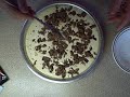 I found this recipe in a Bisquick recipe book. It turned out beautifully and tasted amazing! You just throw the ingredients in a bowl, mix, pour, sprinkle and bake for 25-30 minutes! That's it! Music by Jason Shaw/ Audionautix.com So easy. 1/4 cup milk 2 tsp vanilla 2 eggs 3/4 cup packed brown sugar 1/4 cup Bisquick baking mix 2 packages (8oz each) cream cheese. Each package cut into 16 pieces and pieces allowed to come to room temperature to soften them. 3-chocolate covered English toffee bars (like Heath Bars or Skor bars) coarsely chopped. Bars are 1.4 oz each (39g) Caramel or chocolate topping (I used ice cream sundae topping) 1. Heat oven to 325F Spray bottom of a 9