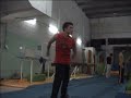 Tricks with metal staff.