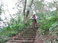 Girl MTB in Maokong Trail- Nicole riding down stairs Girl MTB in Maokong Trail- Nicole riding down stairs
