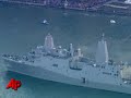 The new Navy assault ship USS New York, built with World Trade Center steel, arrived in its namesake city Monday with a 21-gun salute near the site of the 2001 terrorist attack. (Nov. 2)