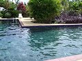 the new reclining bhudda statue by the pool at kalani honua oceanside retreat center