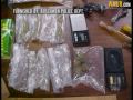 Police Say Drugs, Guns Found During Search