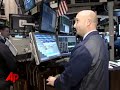 Stocks Open Lower As Overseas Markets Slide