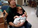 big-brother-caressing-newborn-baby-brother.html