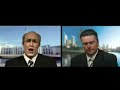 ben price as john howard in a mock satellite interview, interviewed by james o'neil