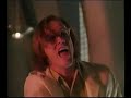 scenes from batman forever. jim carrey (edward nygma)'s invention