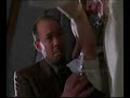 scenes from batman forever. jim carrey (edward nygma)'s invention