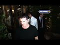 simon cowell leaves ago restaurant in west hollywood, california. usa