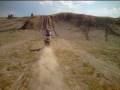 DIRTBIKE JUMPING being followed by bike with helmet camera