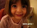 Adorable little French girl with beautiful eyes telling a story