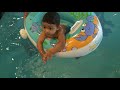 Arnu swimming with dad