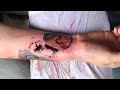 www.dabealan.com So after a long-while of me trying to hog traffic over to my flickr account, I decided to finally post my tattoo stop-motion video to youtube. The tattoo is taking longer than anticipated to finish so I've decided to post it up here for more people to see while I get work done on it. From my flickr that day: So with the help of Tony Touch, I am getting an awesome Nerd sleeve worked on whenever I go visit Toledo. We decided to roll with an evolution of cameras at first, then more nerdy references above. Tony got the idea from another artist to do a stop-motion video where it looks like the tattoo does itself. I brought in a single alienbee and softbox, plus my handy new remote, and we got to it. Hopefully we'll do this for the entire arm. I'd love to have that kind of record of progress on this :) Since everyone is asking, some things about the tattoo: -The actual time of the sitting was 4 hours -This video is comprised out of 1054 shots -