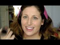 trucco ispirato a jennifer lopez nel video live it up ( quello delle labbra gialle heheeh) :-) besooooo.
