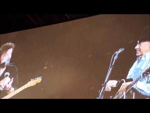 Ronnie Dunn and George Strait sing together