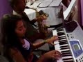 Andinho (sax) e Lais (teclado)