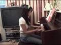 Chrisha playing piano