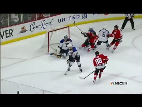 winner - Chicago Blackhawks forward Patrick Kane unleashes the OT winner into the short side of the net past St. Louis Blues goalie Ryan Miller.