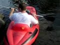 Ian getting in his canoe 2