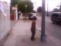 MIDGET CLIMBS THE LIGHT POLE