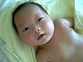 Kynan happily 2 months old