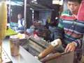 Grilled corn on a cob at Shilin Night Market