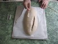 Scoring a loaf of bread