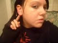 me peircing my ear. me peircing my ear.