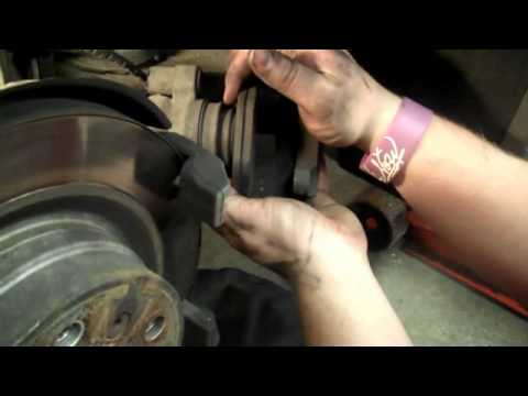 Replace rear brake pads on 2008 BMW 328i. By: Ross T.