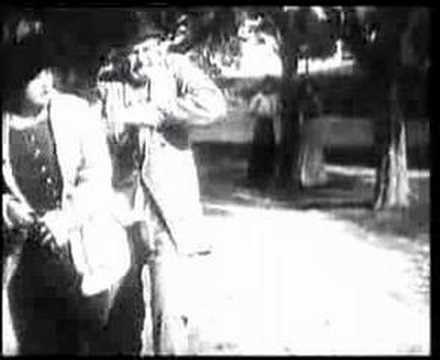 Charlie Chaplin Between Showers
