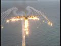 An AFSOC MC-130 pops flares used to decoy enemy heat seeking missiles