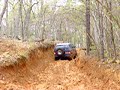 Monster Isuzu Trooper on rocky mountatin loop