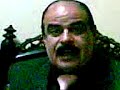 العميد السابق بالشرطة المصرية محمود قطري و المحامي حالياً بدمنهور يؤكد في زجله أن جورج بوش تسبب في خراب العالم
