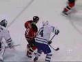 Belfour checking Gionta