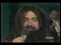 Eduardo Manzano y una genial imitación a Demis Roussos. When I'm a kid I'll go and play With misty wind Singing along, tapping along Clapping away. When I'm a boy I'll go back to my good old toys Singing along, Clapping along Day after day. La, la, la, laa