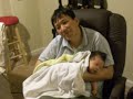 Daddy is soothing the colic baby WARREN Daddy is soothing the colic baby WARREN