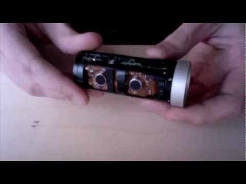 isight - Note: I removed the tiny spring and attached it to the lens assembly with a small piece of electrical tape. I then stashed both inside the case of the webcam...