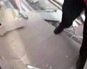 Smashing fluro tube over head Smashing fluro tube over head
